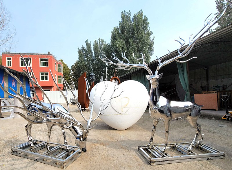 large metal deer sculpture