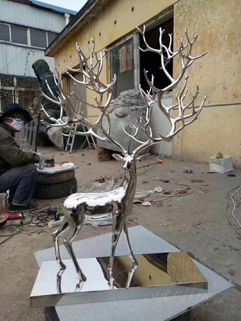 large metal deer sculpture