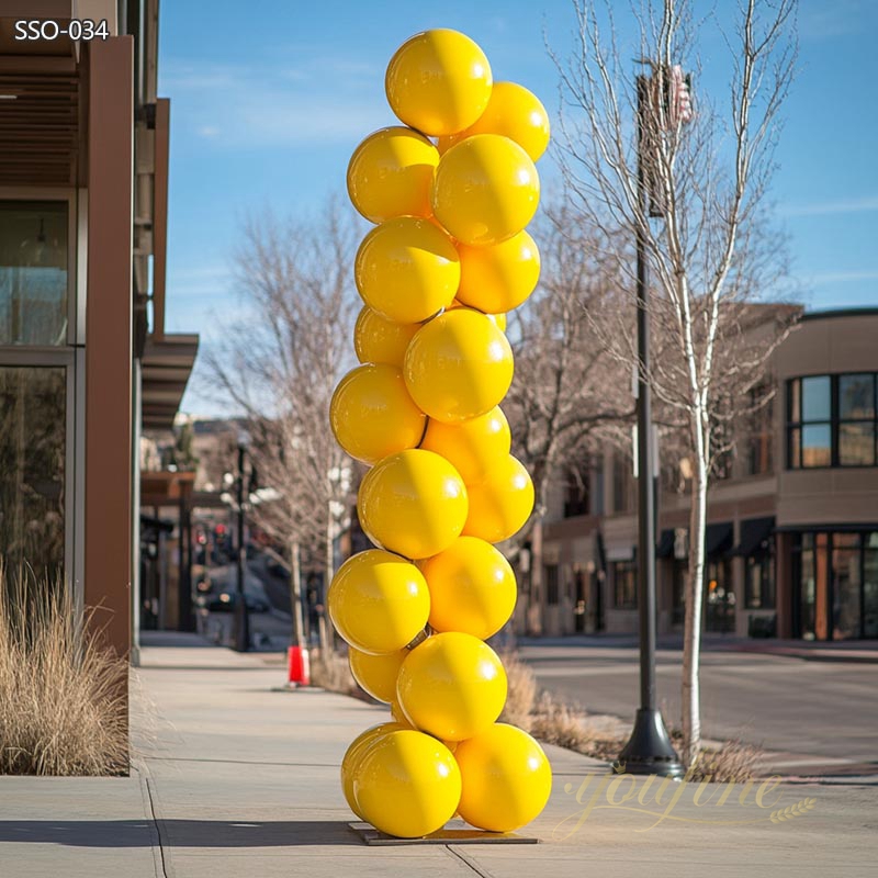 Eye-Catching Yellow Stainless Steel Ball Column Sculpture