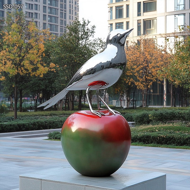 Modern Steel Bird Sculpture with Apple