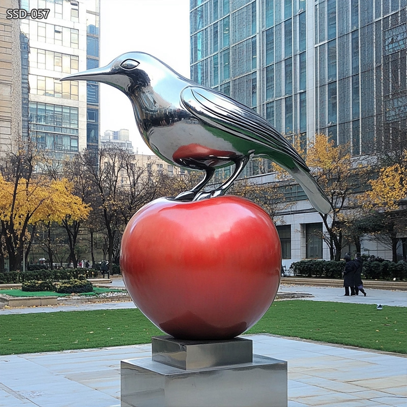 modern Steel Bird Sculpture with Apple