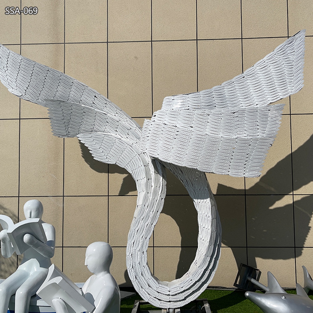 white modern metal Abstract Wing Sculpture