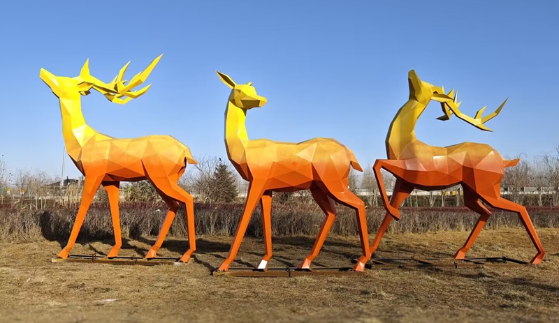 outdoor colorful geometric deer sculpture